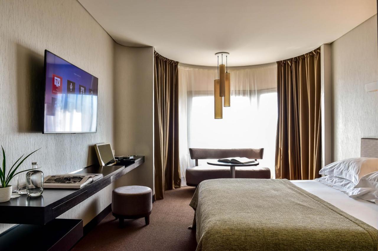 Porto Palacio Hotel By The Editory Екстериор снимка A room at the hotel