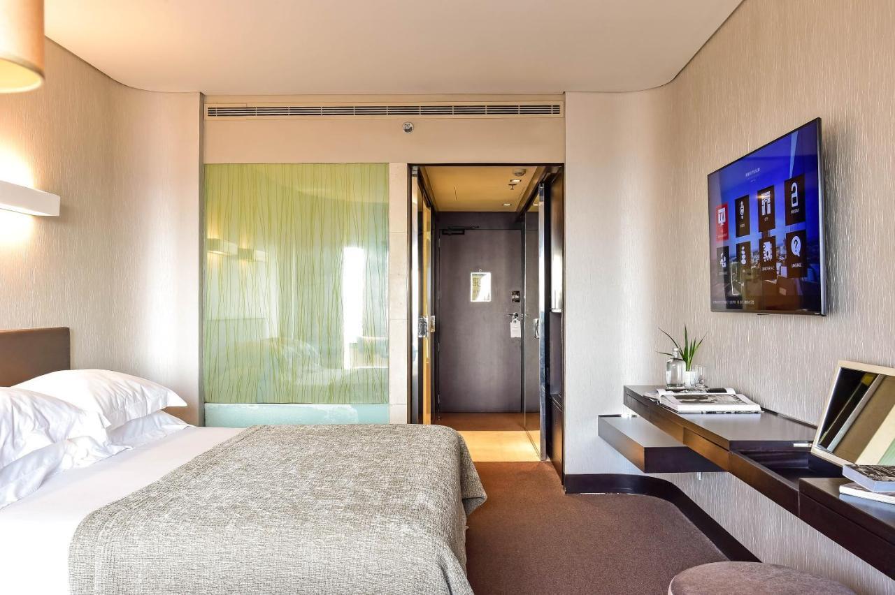 Porto Palacio Hotel By The Editory Екстериор снимка A room at the hotel